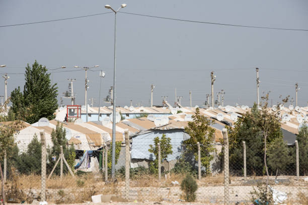 refugee camop in Akcakale Akcakale, Turkey - September 6, 2017. Syrian official refugee camp in Akcakale. This camp is for syrian people from Idlib, Aleppo and Rakka. akçakale stock pictures, royalty-free photos & images