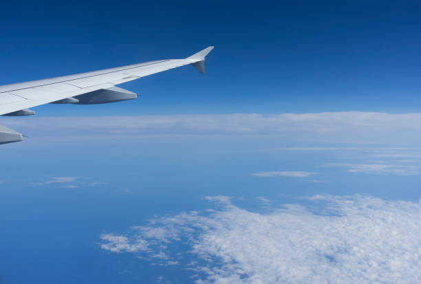 istock Cumulus clouds in a sunny clear sky day 847764334