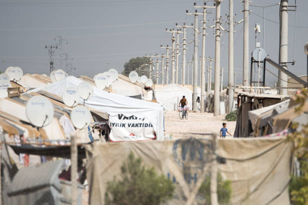 refugee camop in Akcakale Akcakale, Turkey - September 6, 2017. Syrian official refugee camp in Akcakale. This camp is for syrian people from Idlib, Aleppo and Rakka. akçakale stock pictures, royalty-free photos & images