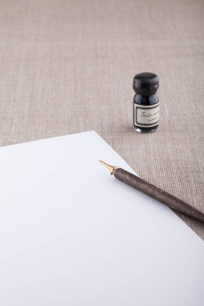 istock Fountain pen and ink with white sheet 847767392