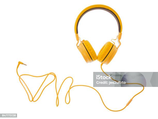 Yellow Headphones Or Earphone Computer Isolated On A White Background Stock Photo - Download Image Now