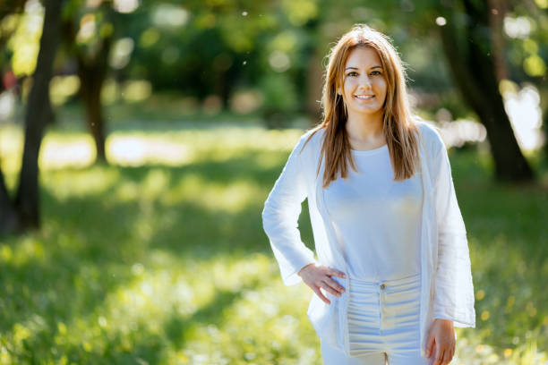 istock Beautiful brunette in nature 847785760