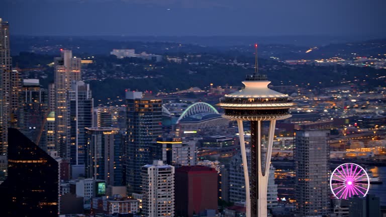 AERIAL Night view of the Space Needle and Seattle