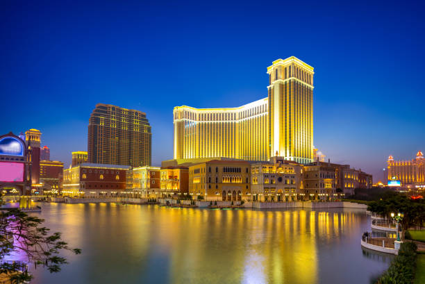luxury hotel and casino resort night view of a luxury hotel and casino resort in Macau macao photos stock pictures, royalty-free photos & images