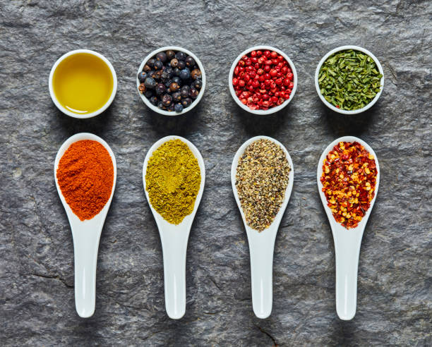 istock Flat lay of different flavors and spices on slate background 847794860
