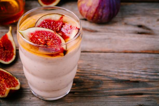 istock healthy breakfast smoothie with fresh figs and honey in glasses 847803692
