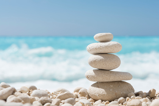 Balanced stones on a pebble beach