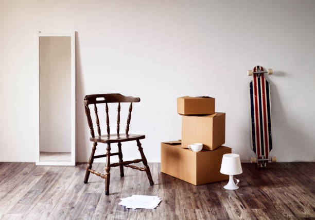 istock Packed cardboard boxes, mirror, chair and other stuff. 847807026