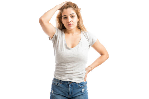 Good looking young woman in casual clothes looking stressed and worried about her problems