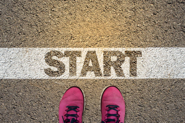 A person standing in the starting line stock photo