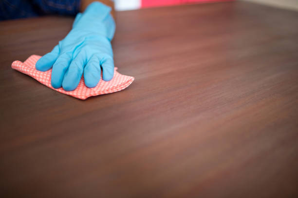 istock Cropped image of person cleaning table 847816130