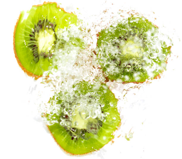 istock juicy kiwi fruit in water on a white background. macro 847818106