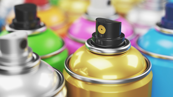 Colored spray paint cans closeup. Render 3d