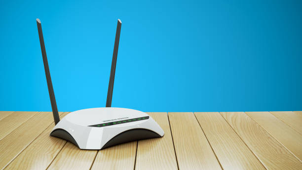 istock Internet Wi-Fi router on wooden table 3d 847825216