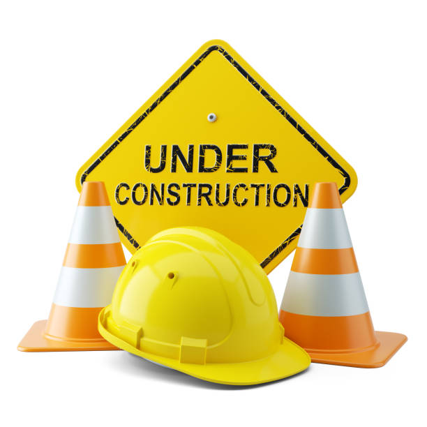 istock Yellow helmet, traffic cones and signboard under construction 3d 847825500