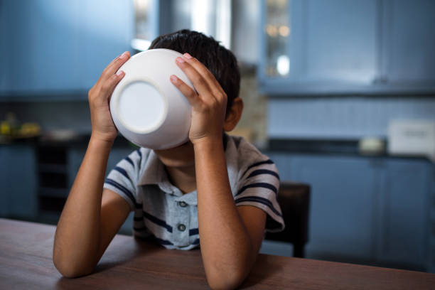 istock Close up of boy having breakfast 847825796