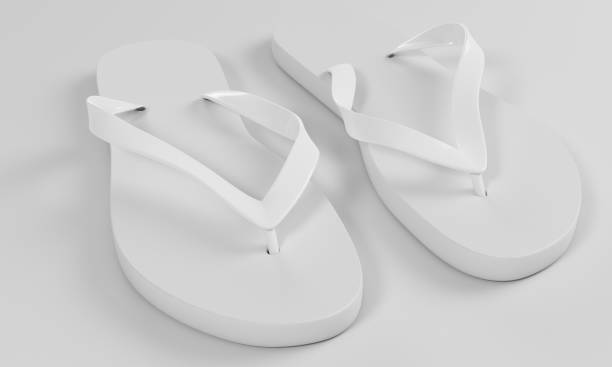istock 3d rendering slippers isolated on sand background mock-up 847829096