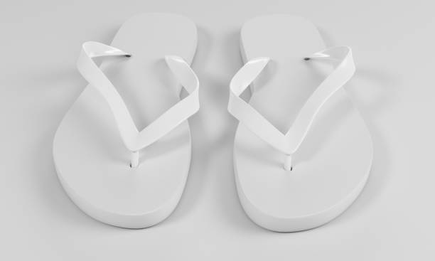 istock 3d rendering slippers isolated on sand background mock-up 847829106