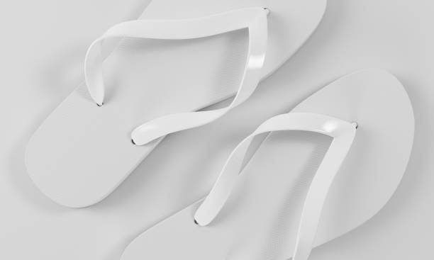 istock 3d rendering slippers isolated on sand background mock-up 847829118