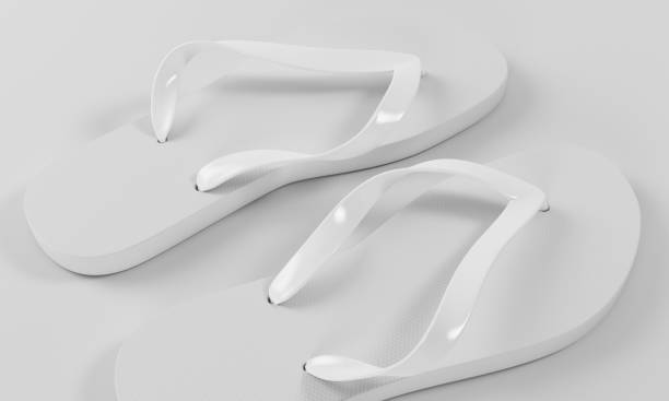 istock 3d rendering slippers isolated on sand background mock-up 847829132