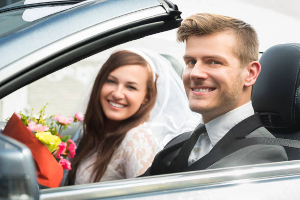 istock Young Just Married Couple In Car 847832236