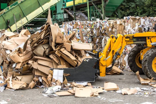 istock Bulldozer At Garbage Collection Center Preparing Garbage For Recycling 847834446