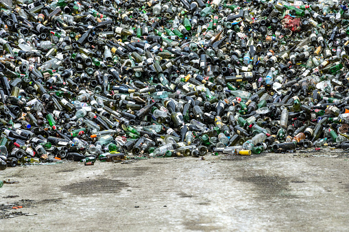 Heap Of Glass Bottle At The Recycling Center