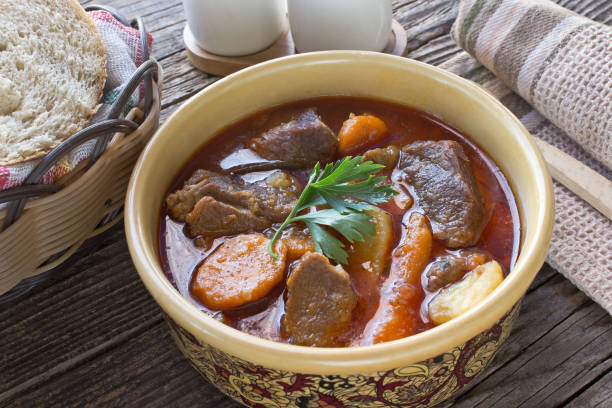 istock Stew with meat and vegetable in ceramic bowl on table 847842294