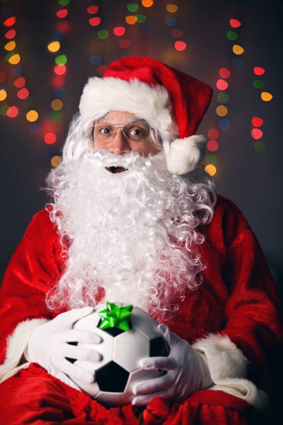 istock Santa Unpacking A Soccer Ball 847843318