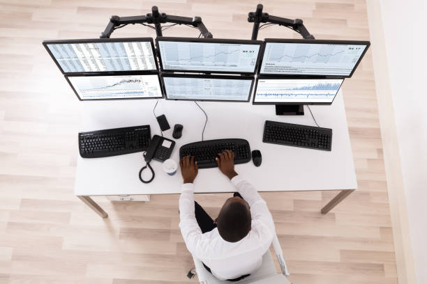istock Stock Market Broker Looking At Graphs On Computer 847845976