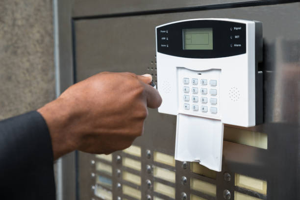 istock Businessperson Using Remote Control To Open Door 847849844