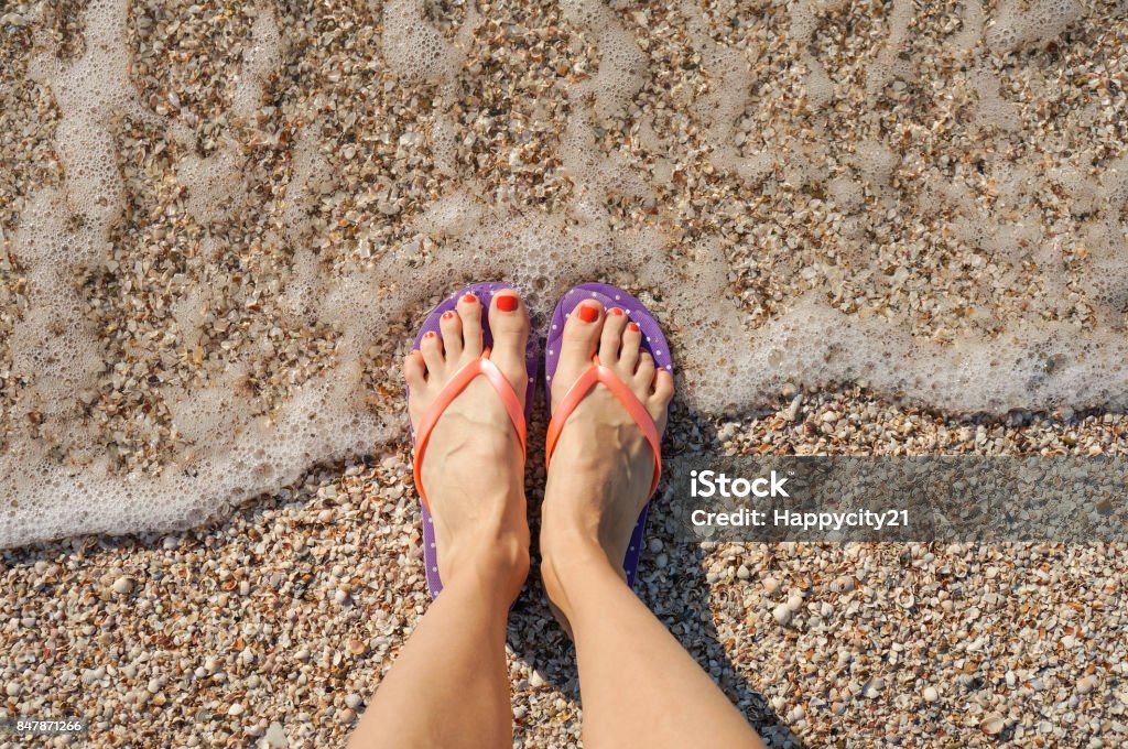 Summer legs on the beach Beach Stock Photo