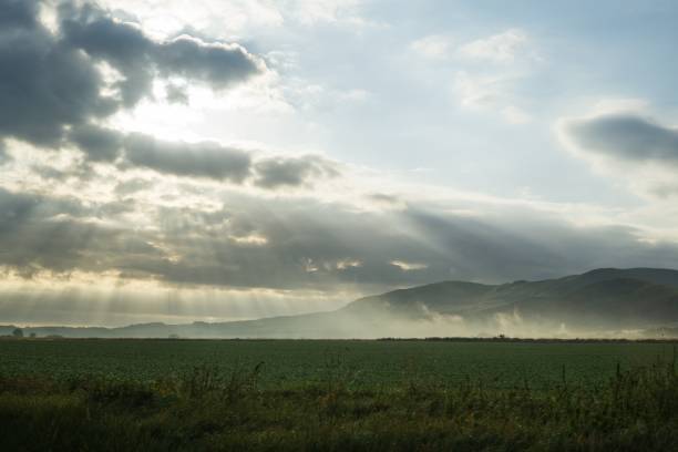 istock Sunrise and sunset over the hills and town. 847883896