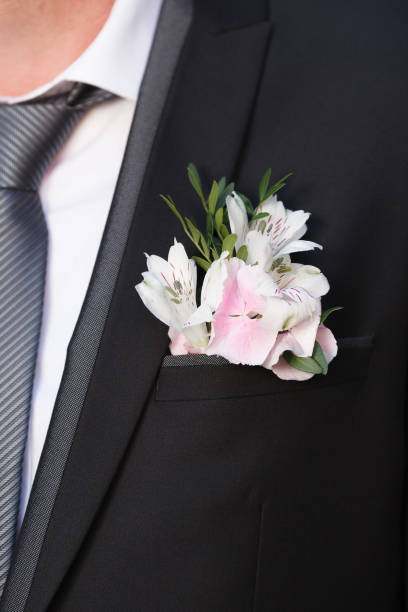 istock White alstroemeria and pink hydrangea boutonniere 847886106