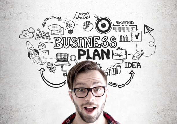 istock Amazed hipster in glasses and a business plan 847886598