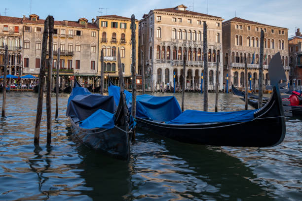 istock Gondola's sit along the Grand Canal in Venice 847890440
