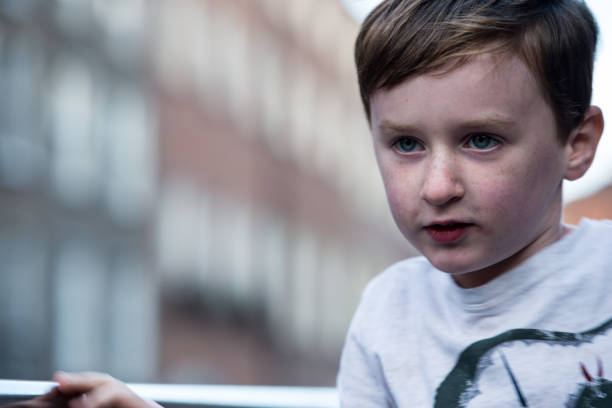 istock Young little boy portrait looking at something 847891364
