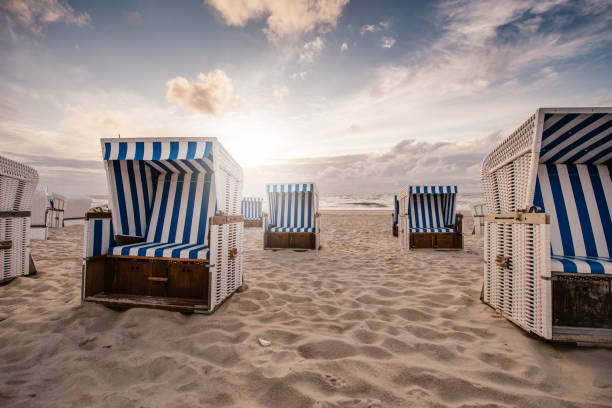 Chairs on beach chairs on beach, Sylt Germany hooded beach chair stock pictures, royalty-free photos & images