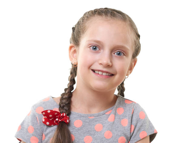 istock pretty little girl studio portrait, white background 847899314