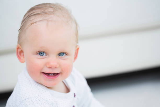 istock Blonde baby with blue eyes 847899704