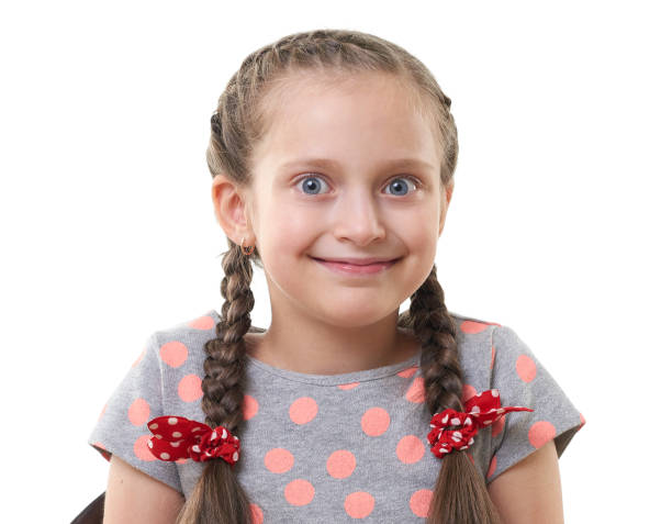 istock pretty little girl studio portrait, white background 847901110