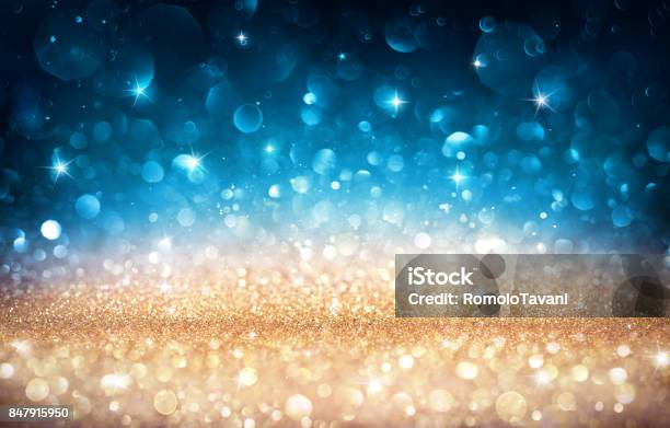 Xmas Shiny Background Golden And Blue Bokeh Stock Photo - Download Image Now - Blue, Defocused, Christmas