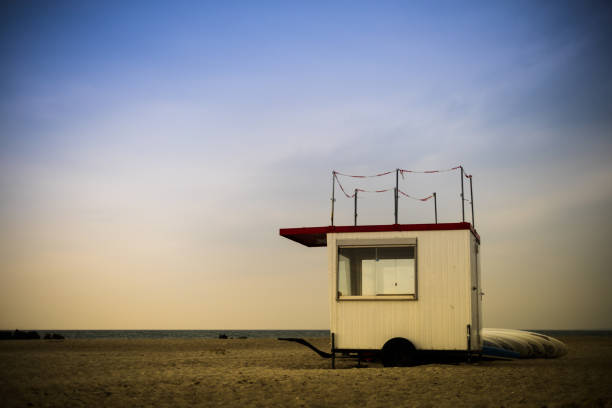istock Lifeguard trailer with surf boards 847923206