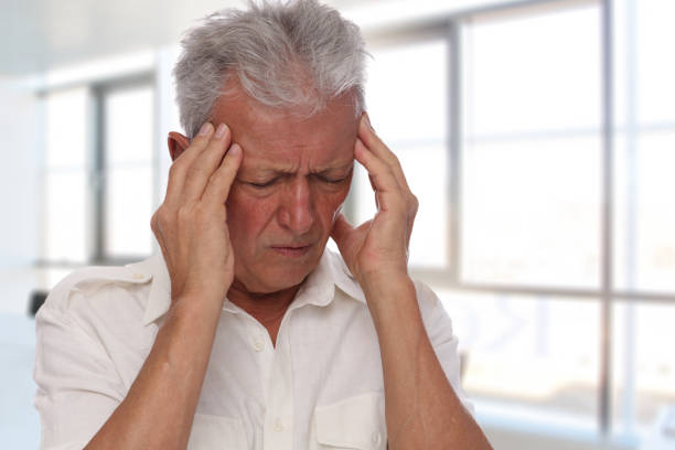 istock Senior man suffering from a headache , migraine 847923812