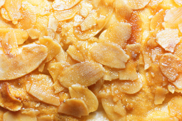 Macro of almond splitters on a cake Macro photo of almond splitters covered with candied sugar. beesting cake stock pictures, royalty-free photos & images