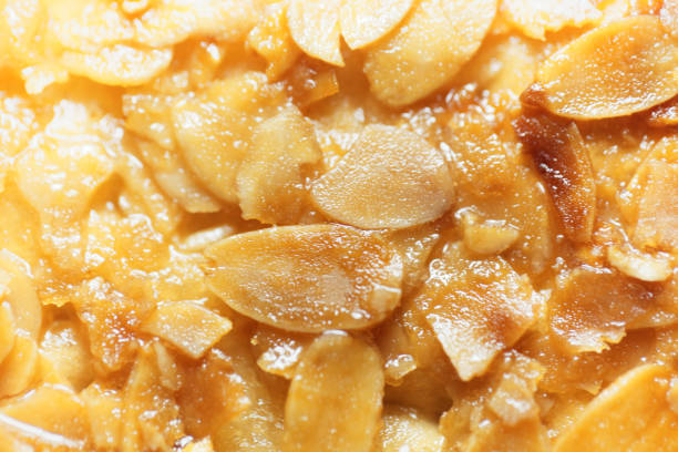 Macro of almond splitters on a cake Macro photo of almond splitters covered with candied sugar. beesting cake stock pictures, royalty-free photos & images