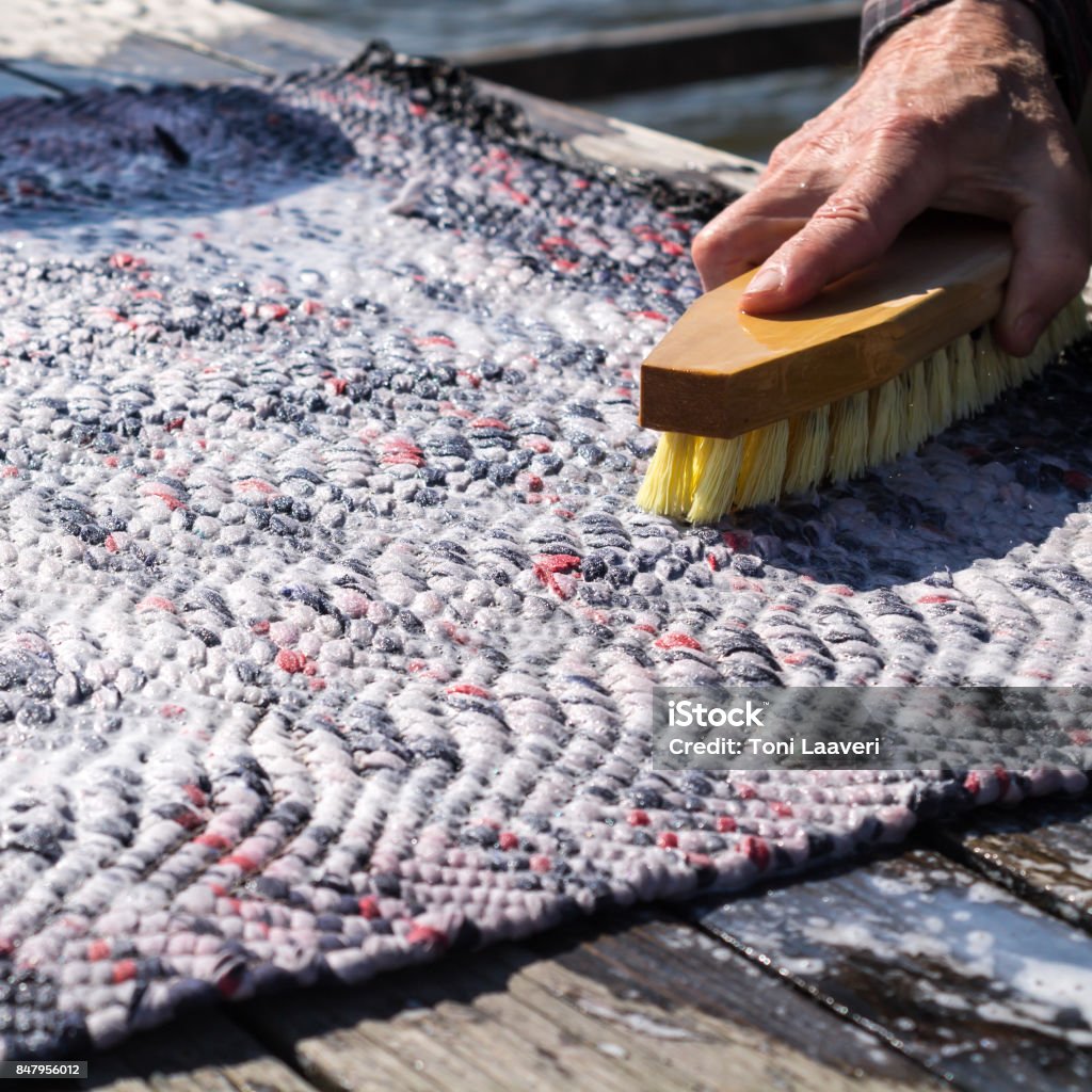 Scrub A Rug Scrubbing The Carpet Stock Photo - Download Image Now - Carpet - Decor ...