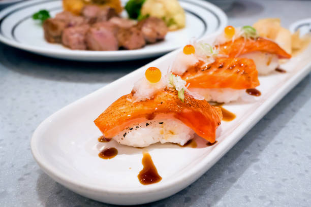 istock Grilled salmon sushi 847956424