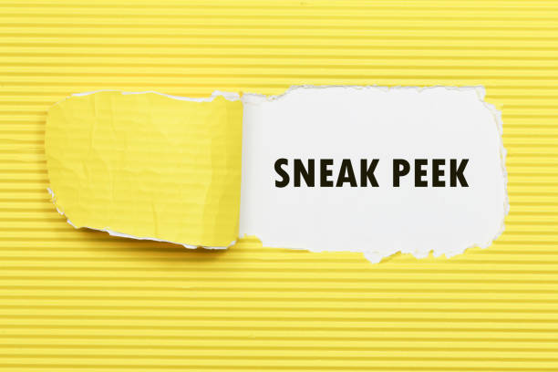 istock The phrase Sneak Peek appearing behind torn yellow paper. 847957194