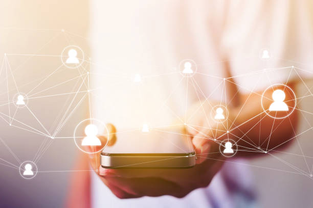 istock Man hand holding mobile phone with map point, Social network concept 847978026